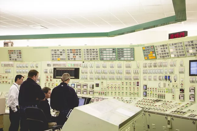 UNDER CONTROL: At the heart of Diablo Canyon sits its control center, where technicians monitor identical sets of instrumentation for each of the plant’s two reactors. - PHOTO BY HENRY BRUINGTON