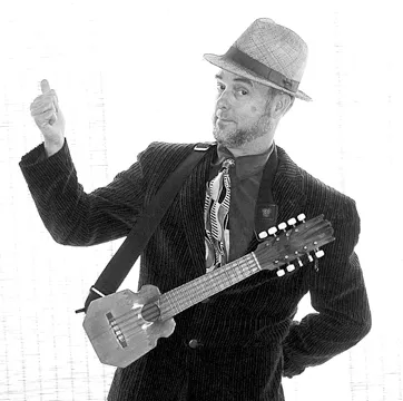 DEVIN VS. TERMINATOR! : Devin Wallace plays Gather Wine Bar on June 23, where he’ll debut his new song about our beleaguered governor. - PHOTO COURTESY OF DEVIN WALLACE