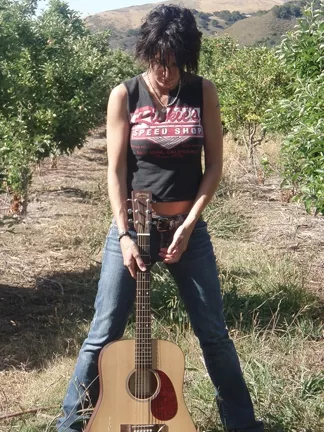 NEW TO TOWN L.A. : scene maker and recent SLO Town transplant Jenn Haase will show off her chops on June 29 at The Clubhouse when she’s the featured performer during the songwriter’s showcase. - PHOTO COURTESY OF JENN HAASE