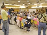 PUMPED UP : Hundreds of people packed a recent meeting to discuss an oil exploration company’s plans to tap abandoned wells in Huasna Valley. - PHOTO COURTSEY HUASNA VALLEY ASSOCIATION