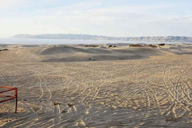 FATAL CRASH: The Oceano Dunes State Vehicular Recreation Area draws a lot of traffic—as indicated in this file photo—but the region’s popularity can lead to problems. Two vehicles collided in the area at dusk on Dec. 28, and Grover Beach resident Bryon Tatum, 52, was killed in the crash. A law enforcement investigation into the incident is ongoing. - FILE PHOTO BY STEVE E MILLER