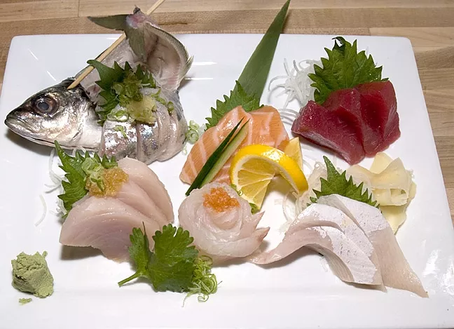 CHEF’S CHOICE: The omakase plate, literally meaning “I’ll leave it to you,” allows the sushi chef to choose the sashimi providing six types of raw fish. - PHOTO BY DAN HARDESTY