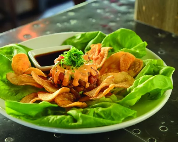 Aloha Ahi Poke salad with housemade thick cut potato chips at Shell Beach Brewhouse. - PHOTO BY STEVE E. MILLER