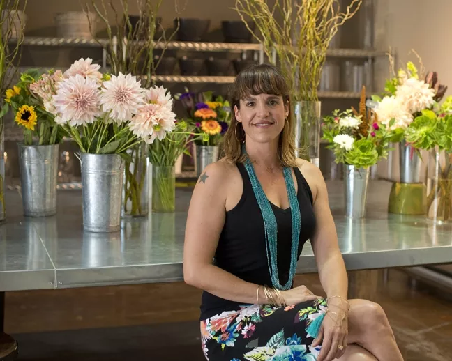 EVERYONE LOVES FLOWERS: Clover and Branch owner Carrie Skelton plays host to a flower fest every Friday in her floral studio, with fresh flower arrangements that’ll look great anywhere you put them. - PHOTO BY STEVE E. MILLER