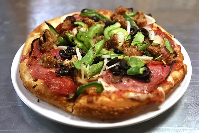 Happiness Is A Warm Za Gino S Pizza Is A Laid Back Adult Hangout