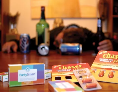 PILL POPPER : Intrepid reporter Glen Starkey drank for the greater good and tested two brands of hangover pills. Did they work? Read on! - PHOTO BY JENNIFER MAY ANTHONY