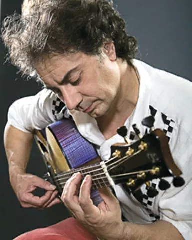 FREEDOM GUITARIST : The world-class French guitarist Pierre Bensusan plays two upcoming SLO Folks shows: March 28 at Coalesce Bookstore and March 29 at Castoro Cellars. - PHOTO COURTESY OF PIERRE BENSUSAN