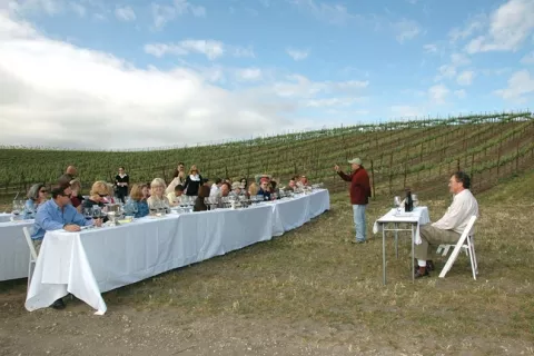 IN THE VINES : Steve Beckman (left) and Kerry Damskey of Palmeri (right) celebrated the recent Syrah Symposium at Beckmens Purisima Mountain Vineyard. - PHOTO BY NELL CAMPBELL, FOR THE SYRAH SYMPOSIUM