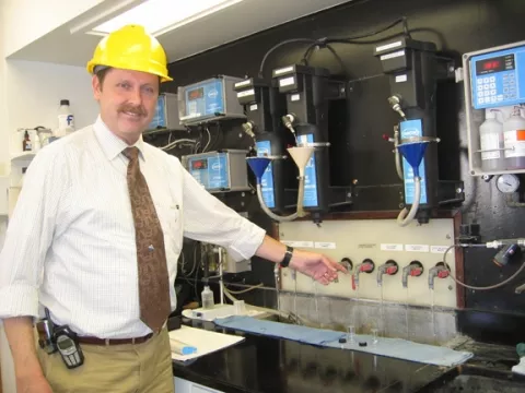 WATER ON TAP : SLO County Water Quality Manager John Beaton takes samples at each part of the treatment process for Lopez water. - PHOTO BY KATHY JOHNSTON