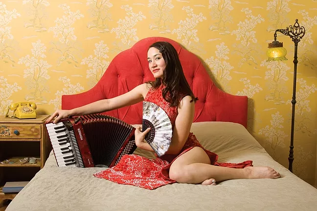FRENCH, ENGLISH, AND CHINESE: Multilingual chanteuse and accordion and toy-piano player Jessica Fichot returns to Steynberg Gallery on May 27. - PHOTO BY ANDY SHENG