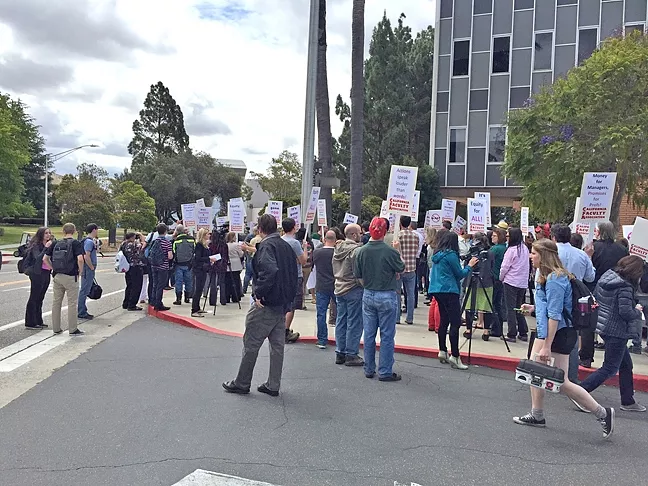 TENSION BREWING: Faculty members protest their contract in front of President Armstrong’s office last spring. - PHOTO COURTESY OF THE CALIFORNIA FACULTY ASSOCIATION