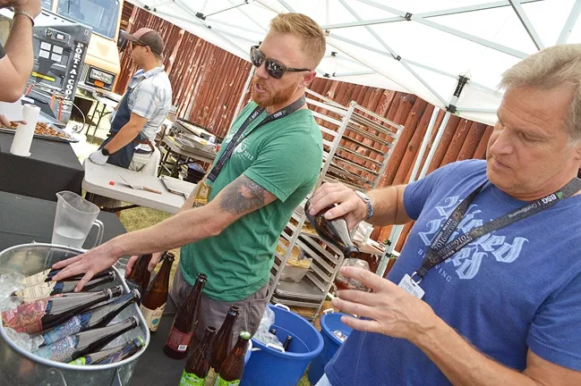 CRAFTY: Firestone Walker Brewing Company held its annual invitational beer festival June 4, in Paso Robles, and brewers such as Wicked Weed Brewing out of Asheville, N.C., brought beers you can’t find on the Central Coast. - PHOTO BY DAVID MINSKY