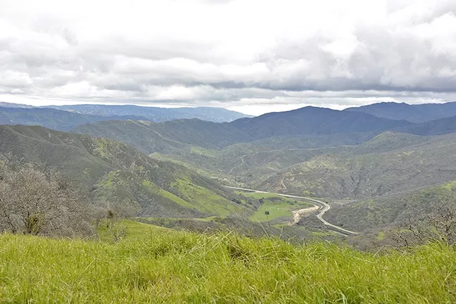 LESS TRAVELED: Highway 166 meanders through the valley below the Adobe Trail in Los Padres National Forest. - PHOTO BY CAMILLIA LANHAM