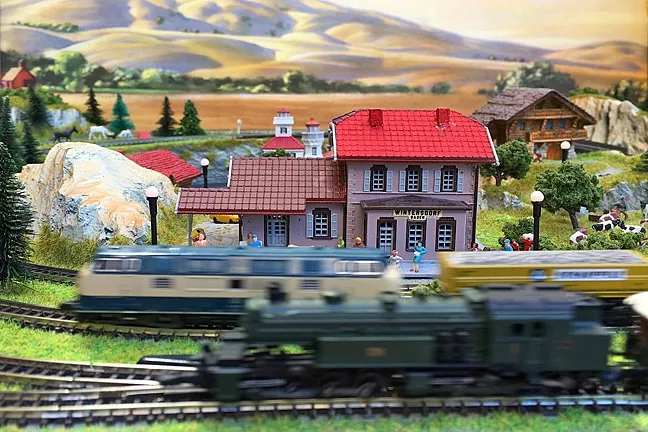 TINY WORLD: This Z-gauge layout owned by Bernd Schumacher fits inside a briefcase. - PHOTO BY GLEN STARKEY