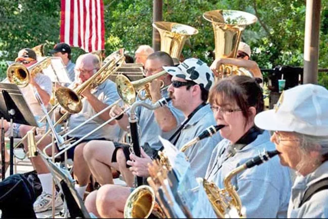 JAMMIN’ FOR A CAUSE : Members of the Atascadero Community Band perform at a benefit barbecue at Atascadero Lake. On May 7, the band will perform a benefit concert in support of Project Lifesaver. - PHOTO COURTESY OF ATASCADERO COMMUNITY BAND