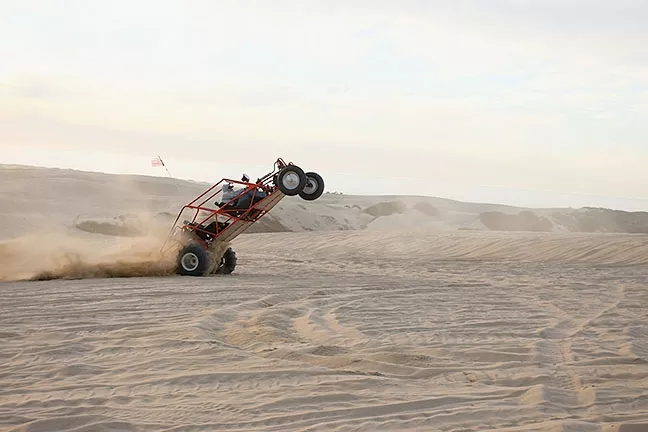 A BUMPY RIDE: A recent bill aimed at reforming California’s off-highway vehicle recreation regulations in places like the Oceano Dunes is pitting riders and OHV enthusiasts against environmentalists. - FILE PHOTO BY STEVE E. MILLER