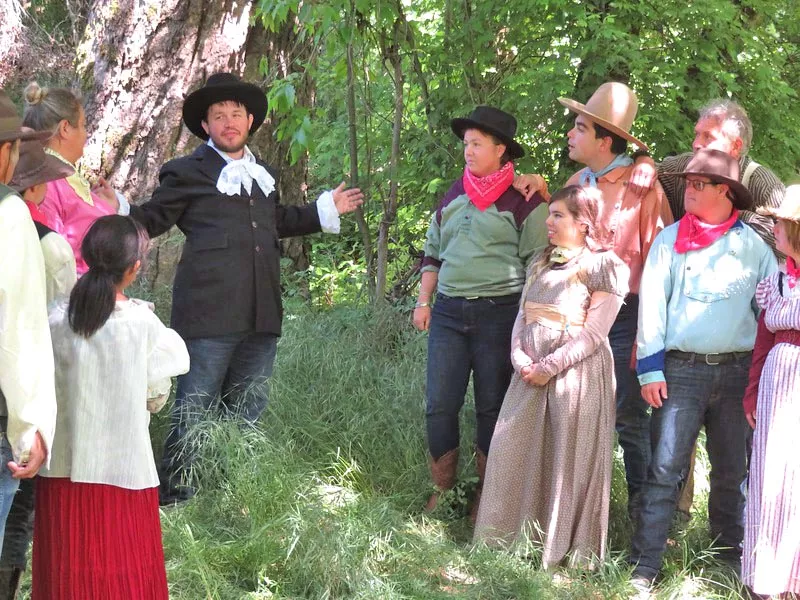 POLITICAL DANCE Senator Beauregard (Jason Cantu, center) tries to drum up support for his re-election among the townsfolk of Dairy Gulch. - PHOTO COURTESY OF SEAN MCALPINE