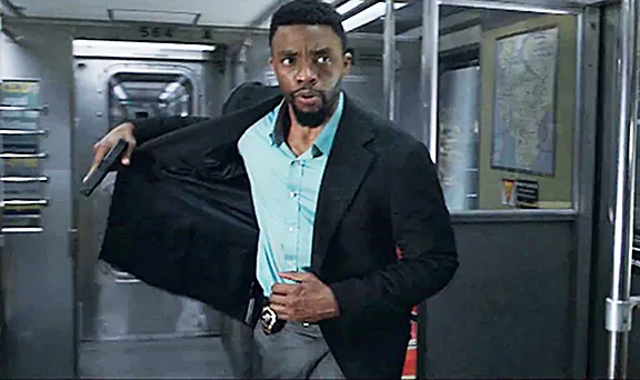 MAN ON A MISSION Chadwick Boseman stars as embattled NYPD Detective Andre Davis, who after two fellow officers are killed, shuts down Manhattan to search for the cop killers but instead discovers a conspiracy, in 21 Bridges. - PHOTO COURTESY OF HUAYI BROTHERS