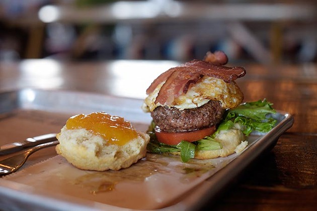 While Okay Yeah Co. is best-known for its homemade hand tarts, it also offers creative takes on diner favorites like its breakfast burger made with fresh veggies and house-made peach-bourbon jam. | Photo Garett Fisbeck