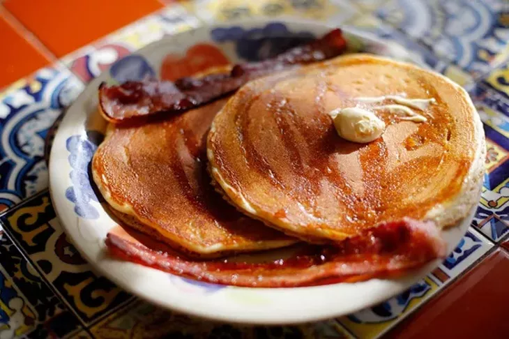 Homemade pancakes and bacon at Jeff's Country Cafe in Oklahoma City, Friday, June 26, 2015. - GARETT FISBECK