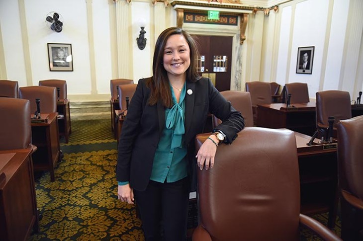Newly elected Cyndi Munson, House District 85, stands next to her desk on the House floor at the Oklahoma State Capitol, 12-18-15. - MARK HANCOCK