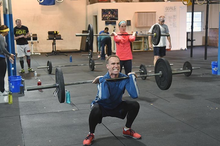 Patrons get into lifting barbells at all different weight levels at 405 CrossFit recently.  mh