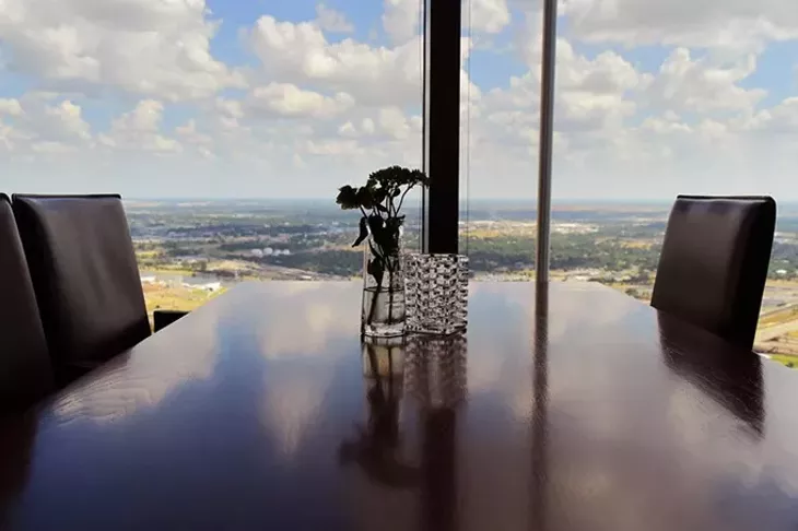 Table view from Vast, 333 west Sheridan Avenue, at the top of the Devon Tower in Downtown Oklahoma City, 9-4-15. - MARK HANCOCK