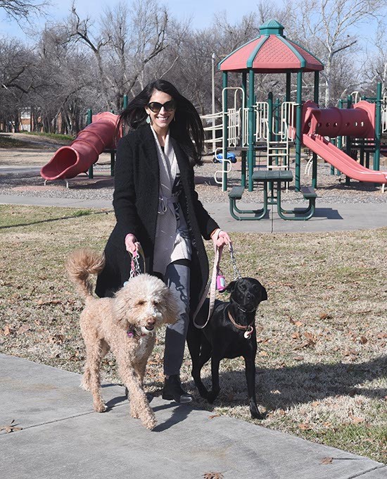 Emmery Frejo walking her two dogs, Molly and Olive, at Goodholm Park in the Jefferson Park Neighborhood of Oklahoma City, 1-5-16. - MARK HANCOCK