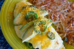 A three-egg omelet surrounded with jalape&ntilde;os, cheddar and avocado. (Shannon Cornman)