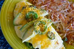 A three-egg omelet surrounded with jalapeños, cheddar and avocado. (Shannon Cornman)