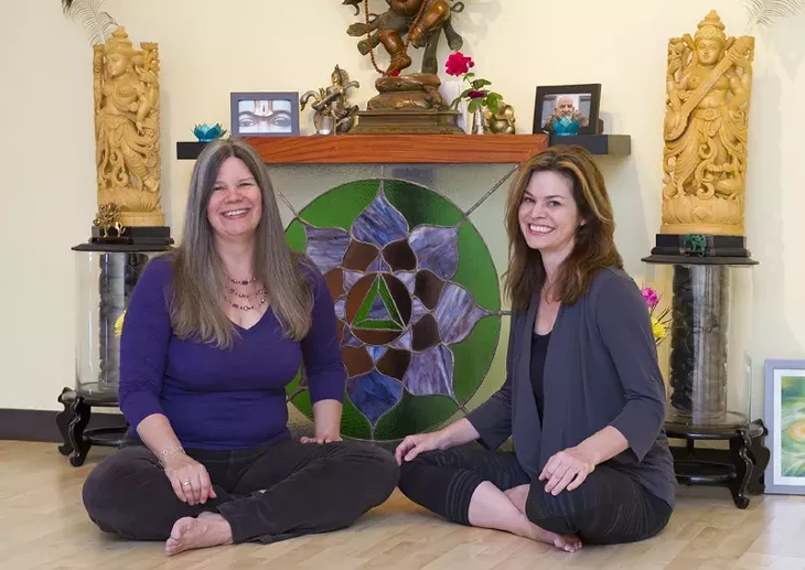Martha McQuaid and Christina Forth at Spirit Yoga. - Photo by Shannon Cornman - SHANNON CORNMAN