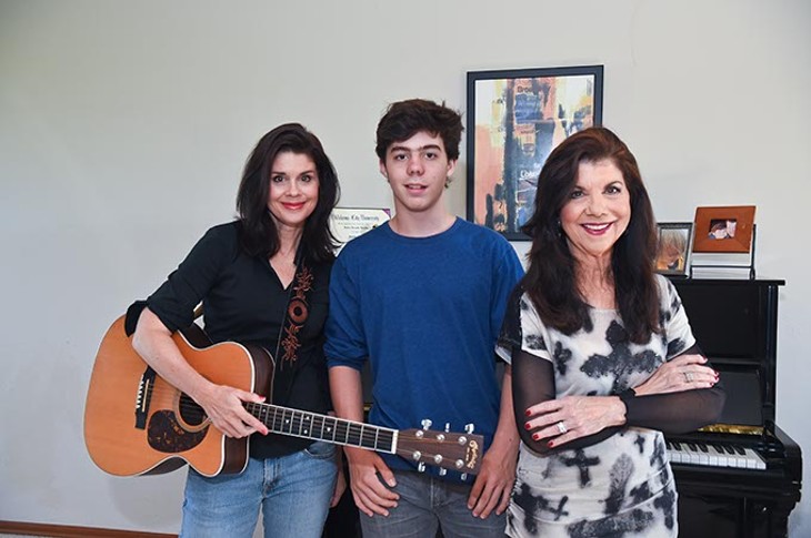 From left, Robin Brooks, Montana Sullivan, and Jody Miller, pose in Robin's Blanchard home music room.  mh