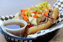 Italian Beef Sandwich with hot peppers at Cal's Chicago Style Eatery in Oklahoma City, Thursday, March 5, 2015. - GARETT FISBECK