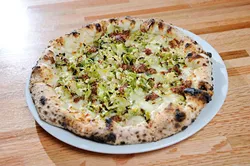Pancetta with Brussels Sprouts pizza at Pizzeria Gusto in Oklahoma City, Tuesday, June 9, 2015. - GARETT FISBECK