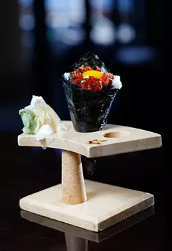Toro-tartar hand roll at Okura Sushi in Oklahoma City, Wednesday, Nov. 11, 2015. - GARETT FISBECK