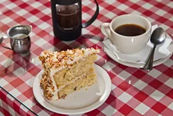 Italian cream cake with French press coffee at Gaberino’s Homestyle Italian in Norman. (Mark Hancock)