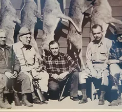 Detail from a photo hanging in Kent Frates' office, center is Charles Urschel, Machine Gun Kelly's kidnap victim, with Frates' Dad, C.L. Frates at right, and and U.S District Judge Edgar Vaught, the trial judge for the Machine Gun Kelly case, at left. mh