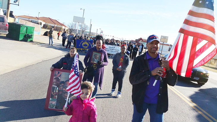 A few hundred participated in a march to honor the legacy of Martin Luther King Jr. along 23rd Street on Jan. 19, 2015. - BEN FELDER