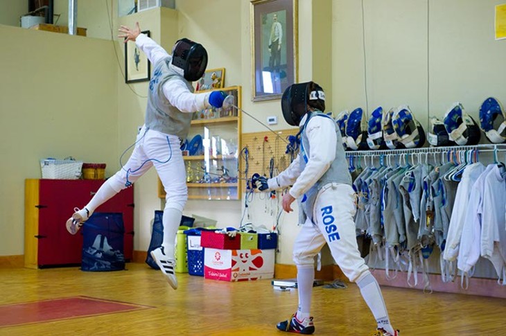Associate and assistants George Adams(left) and Chris Rose demonstrate some bouting techniques at Oklahoma Sport Fencing. - SHANNONCORNMAN