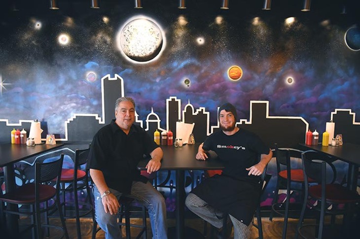 From left, owner, Jerry Coles and head chef, Nick Carson, strike a pose in front of a new mural in their newly reopened, Smokies BBQ, on N. Portland Avenue in OKC, 11-17-15. - MARK HANCOCK