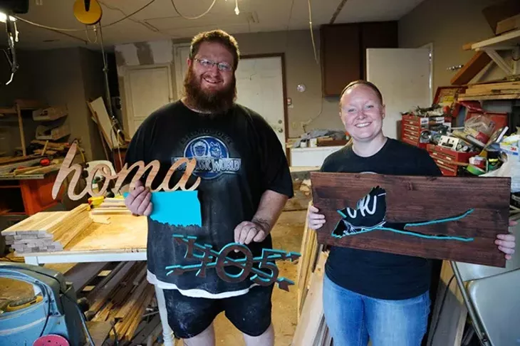 Michael and Hali Lawrence show some of their products at their shop in Bethany, Wednesday, Oct. 14, 2015. - GARETT FISBECK