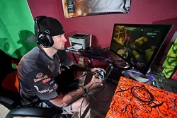 Johnny “Icychiller” Weaver plays Halo at his home in Wellston. (Photo by Garett Fisbeck) (Garett Fisbeck)