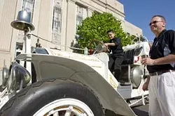 John Vasquez and Raymond Melton admire a 1910 Oklahoma City fire engine parked in front of City Hall for the city's 25th birthday celebration. Photo/Shannon Cornman - SHANNON CORNMAN