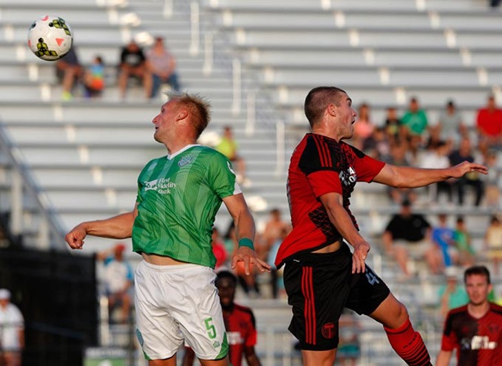 Oklahoma City's Gareth Evans (5) goes against Portland's Tim Payne (40) during a game between Energy FC and T2 at Taft Stadium in Oklahoma City, Friday, June 5, 2015. - GARETT FISBECK