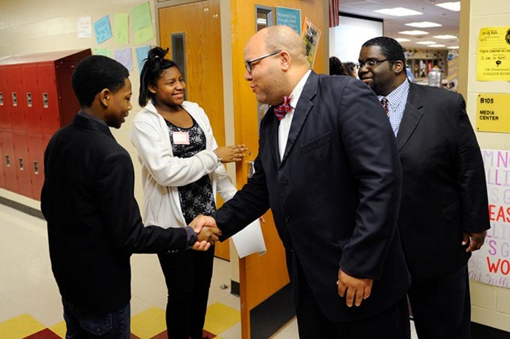 Rep. Mike Shelton shakes hands with student Jemi Thompson during a tour at Centennial High School in Oklahoma City, Wednesday, Jan. 28, 2015. - GARETT FISBECK
