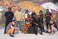 Left to Right, Jabee, John Devere Revive, Robert Levering, Miillie Mesh, Candace Liger, Nymasis, Gregory Jerome the Hip-Hip Festival organizer, Jeremiah Lavender, Angel Little, and Kris Kanaly. All are artists participating in the Hip-Hop Festival, photographed in front of the mural in the parking area on Northest 9th Street in OKC, 8-26-2015. Mark Hancock