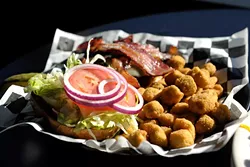 Bacon swiss burger with fried okra at Lumpy's Sports Bar and Grill in Oklahoma City, Tuesday, Nov. 18, 2014. Photo by Garett Fisbeck - GARETT FISBECK