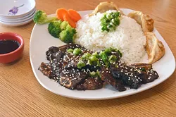 Grilled short rib rice platter at B&B Wok, Noodles and Moore. mh