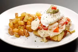 Chicken and waffle at Bonjour in Oklahoma City, Wednesday, July 29, 2015. - GARETT FISBECK