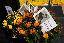 Flower arrangements with cards in memory of people who have died of perscription drug overdose during an International Overdose Awareness Day rally at the Oklahoma State Capitol in Oklahoma City, Monday, Aug. 31, 2015. - GARETT FISBECK